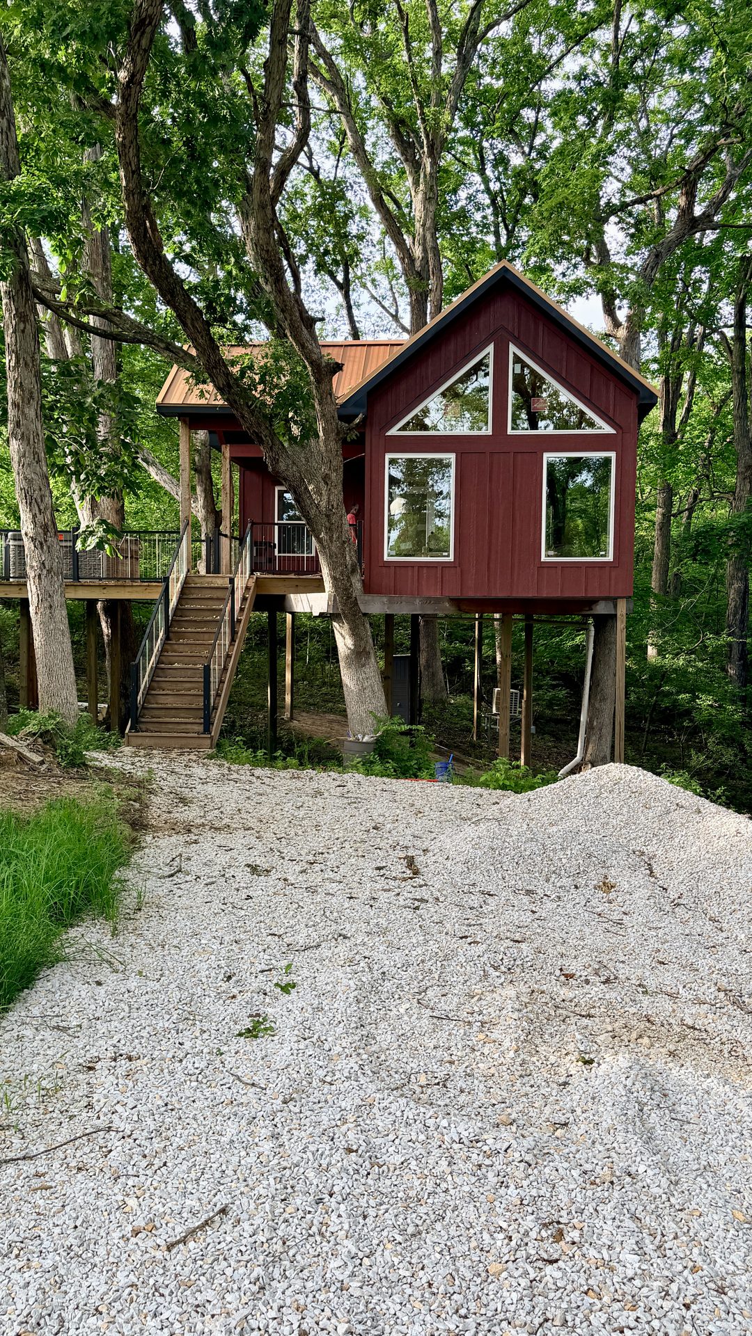 Elevated treehouse among the trees at Woodland Lofts